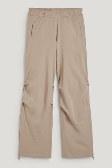 Esclusiva online - CLOCKHOUSE - pantaloni sportivi - beige chiaro
