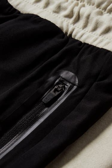 Hommes - Pantalon de jogging - noir / beige