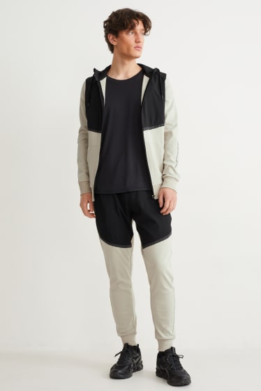 Hommes - Pantalon de jogging - noir / beige