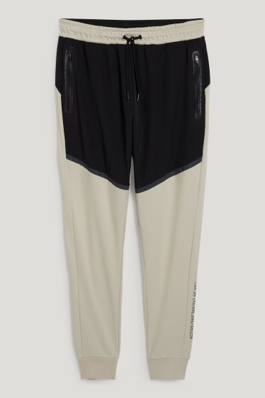Hommes - Pantalon de jogging - noir / beige