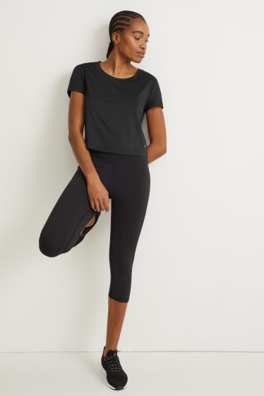 Donna - Maglia tecnica dal taglio corto - fitness - 4 Way Stretch - nero