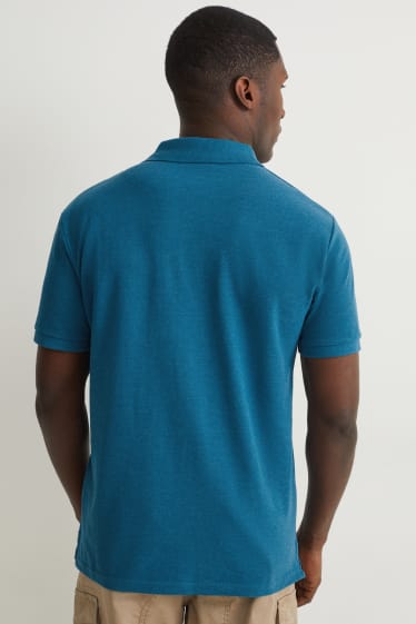 Uomo - Polo - petrolio