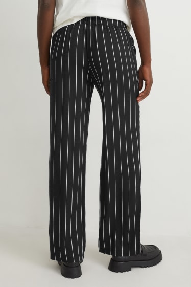 Women - Cloth trousers - high waist - wide leg - black