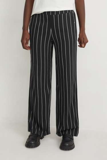 Women - Cloth trousers - high waist - wide leg - black