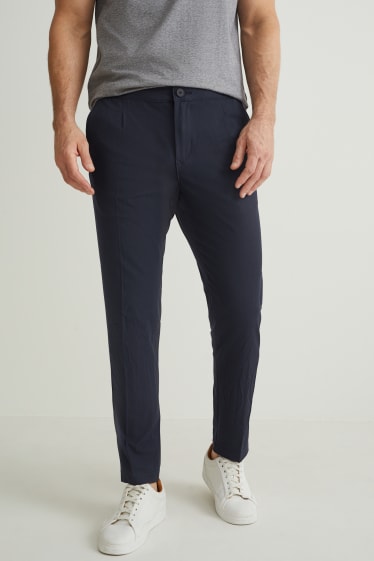 Mężczyźni - Spodnie chino - tapered fit - Flex - ciemnoniebieski