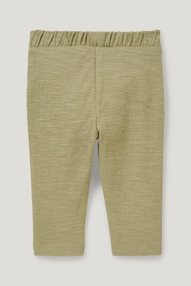 Miminka chlapci - Teplákové kalhoty pro miminka - světle zelená