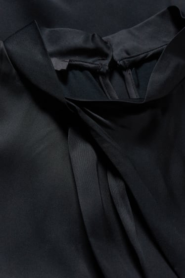 Dona - Brusa sense mànigues - negre