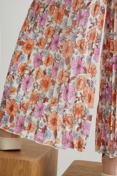 Bambine: - Pantaloni plissettati - a fiori - rosa