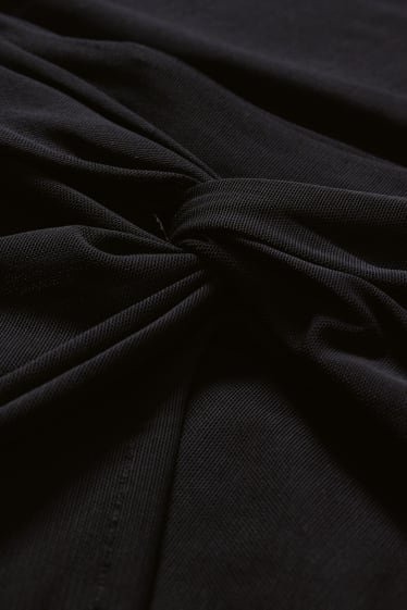 Mujer - Falda con nudo - negro