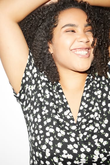 Femmes grandes tailles - CLOCKHOUSE - robe portefeuille - à fleurs - noir