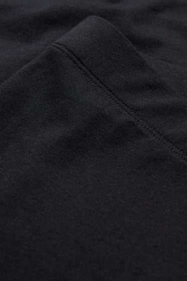 Damen - Capri-Leggings - schwarz