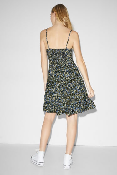 Clockhouse femme - CLOCKHOUSE - robe fit & flare - motif floral - noir