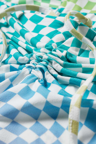 Exclusief online - CLOCKHOUSE - jersey-broek - comfort fit - geruit - lichtgroen