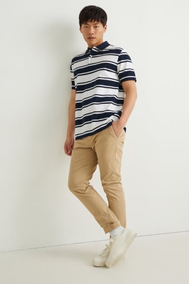 Home - Polo - de ratlles - blau fosc / blanc