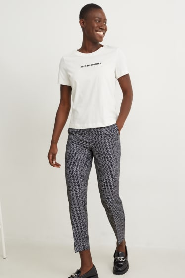 Donna - Pantaloni - vita alta - tapered fit - fantasia - nero / bianco