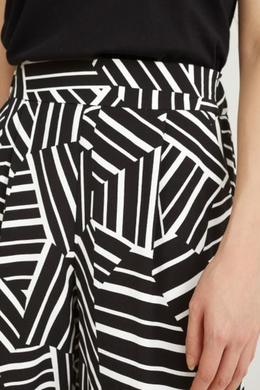 Dames - Pantalon - high waist - palazzo - met patroon - zwart / wit