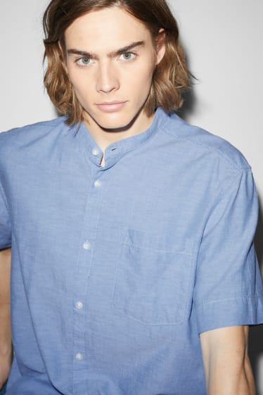 Clockhouse nen - Camisa - regular fit - coll alçat - blau clar