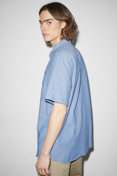 Clockhouse nen - Camisa - regular fit - coll alçat - blau clar
