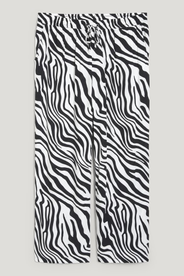 Femmes - Pantalon de toile - mid waist - wide leg - à motif - noir / blanc