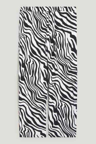 Femmes - Pantalon de toile - mid waist - wide leg - à motif - noir / blanc