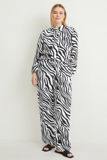 Femmes - Pantalon de toile - mid waist - wide leg - à motif - noir / blanc