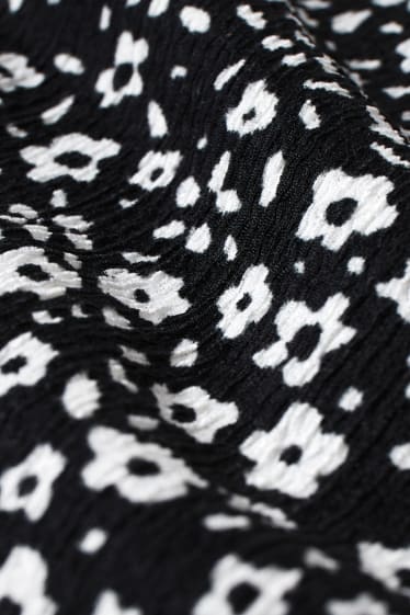 Women XL - CLOCKHOUSE - jumpsuit - floral - black / white