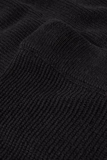Women - Knitted trousers - mid-rise waist - palazzo - black