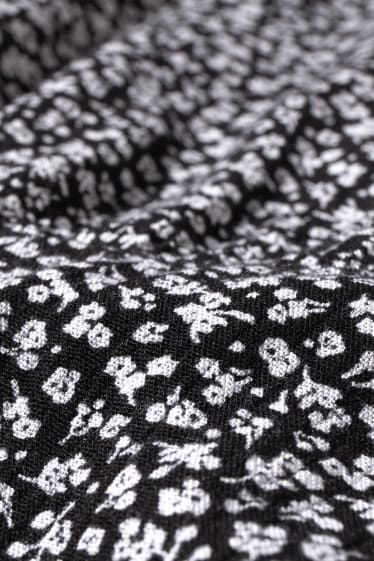 Dames XL - CLOCKHOUSE – A-lijn-jurk - gebloemd - zwart / wit