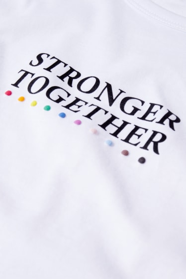 CLOCKHOUSE - top crop - unisex - PRIDE - blanco