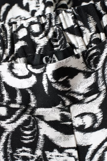 Women - Cloth trousers - mid-rise waist - wide leg - patterned - black / white