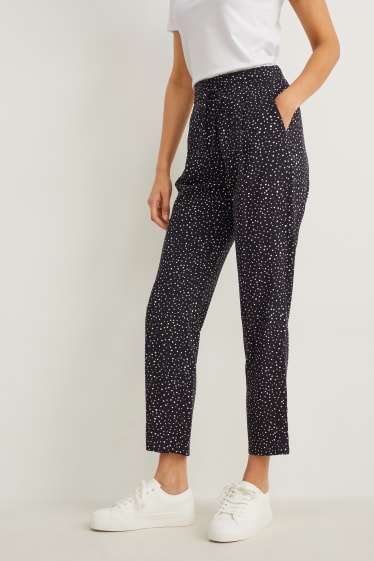 Women - Cloth trousers - high-rise waist - tapered fit - polka dot - black / white
