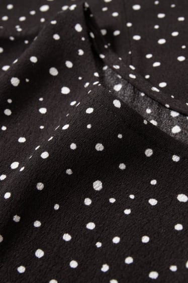 Damen - Bluse - gepunktet - schwarz