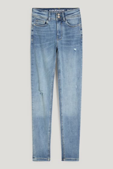 Clockhouse Girls - CLOCKHOUSE - skinny jeans - mid waist - push-up effect - jeanslichtblauw