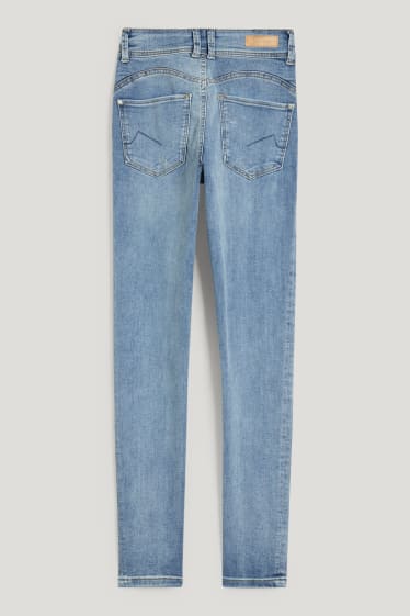 Clockhouse Girls - CLOCKHOUSE - skinny jeans - mid waist - push-up effect - jeanslichtblauw