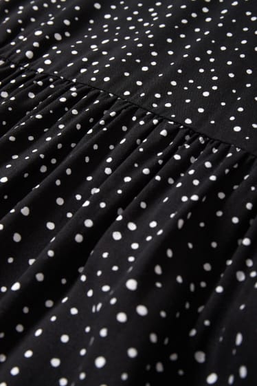 Damen - Kleid mit V-Ausschnitt - gepunktet - schwarz