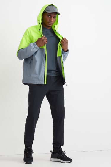 Herren - Regenjacke mit Kapuze - neon grün