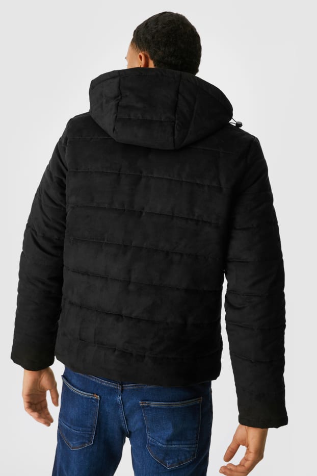 Mężczyźni - Pikowana kurtka z kapturem - imitacja skóry welurowej - czarny