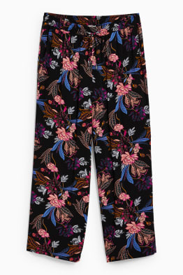 Spodnie materiałowe - średni stan - szerokie nogawki - w kwiaty