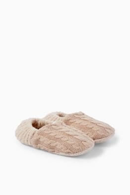 Knitted slippers - cable knit pattern