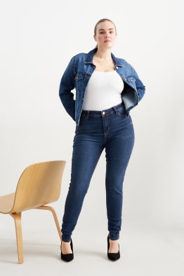 Skinny jeans - średni stan - dżinsy modelujące - LYCRA®