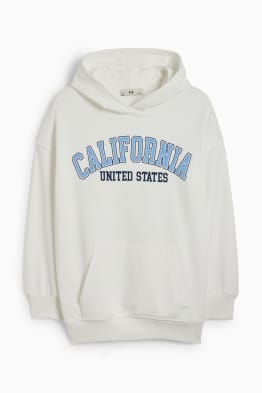 C en top a hoodie