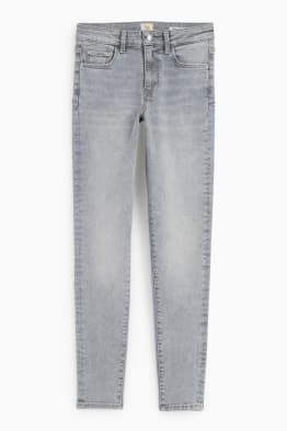 Skinny jeans - średni stan - dżinsy modelujące - LYCRA®