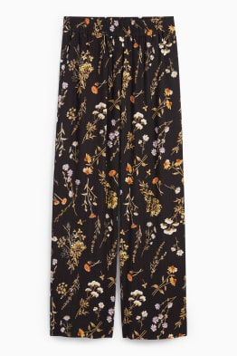 Spodnie materiałowe - wysoki stan - wide leg - w kwiaty