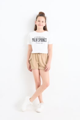 Soigner son style avec un joli short pour fille de chez C A