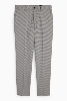 Pantalons a carreaux couleurs et tailles variees C A
