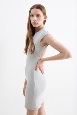 Vestito aderente con cut-out