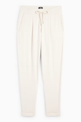 Broek van jersey - mid waist - tapered fit