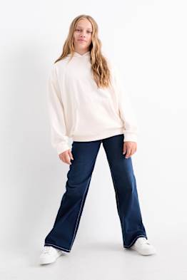 Jean à jambes évasées