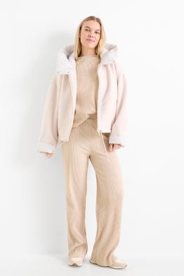 Pantalon en jersey - mid waist - jambe large - finition côtelée