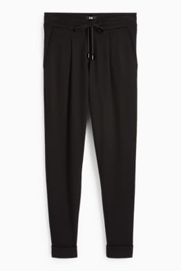 Broek van jersey - mid waist - tapered fit